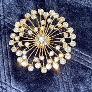Mid century modern starburst gold color crystal brooch